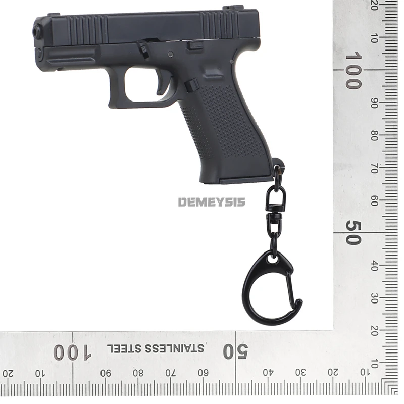 Mini G45 Pistol Shaped Keychai - огляд і ціна Photography Magazine
