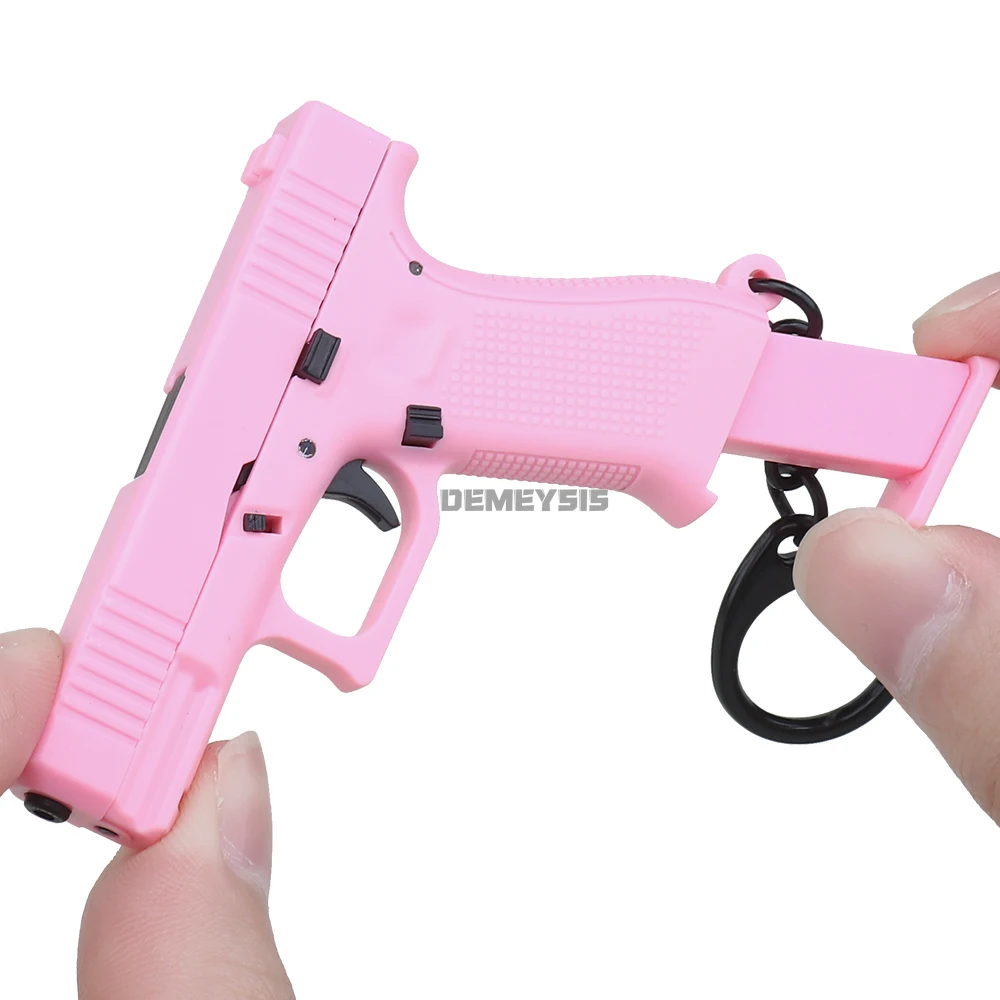 Mini G45 Pistol Shaped Keychai - огляд і ціна Photography Magazine